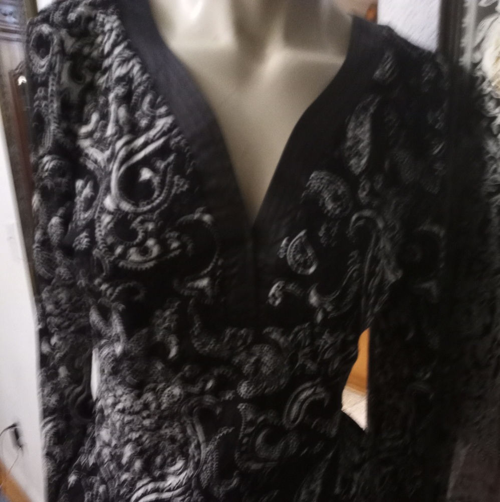 Size M N.I.C. pastel black blouse new with tags